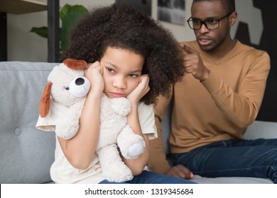 Stubborn Naughty African Preschool Child Girl Closing Ears Ignoring Angry Strict Black Dad Scolding Yelling Reprimand Kid Daughter For Rude Disrespect Mistake, Parents Children Family Fight Concept