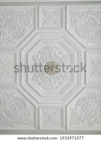 stucco pattern on the ceiling of the house. Concept for interior decoration and classic architecture.