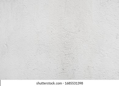 Stucco texture of an empty white painted concrete wall. Industrial architectural background