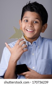 Student With  Award In Hand