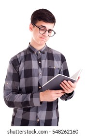 Student boy reading lecture in notepad isolated on white