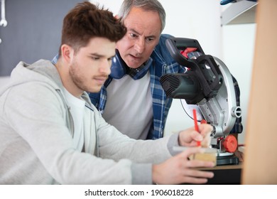 Student In Carpentry Class Using Circular Saw