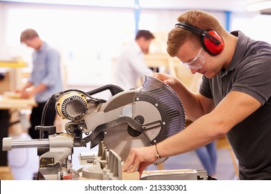 Student In Carpentry Class Using Circular Saw