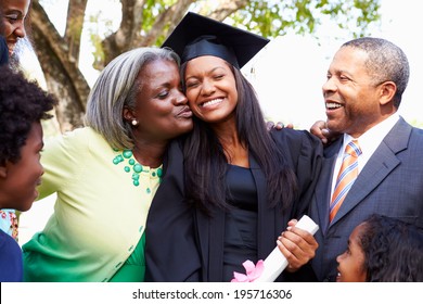 Student Celebrates Graduation With Parents