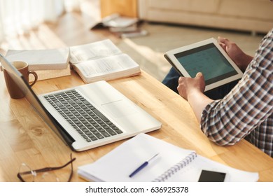 Student Checking His Timetable Before Doing Homework