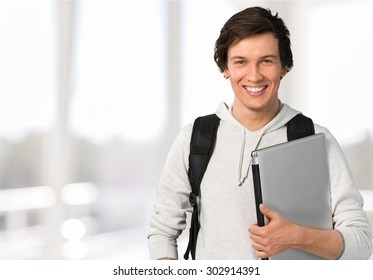 19,447 College Students Holding Laptop Images, Stock Photos & Vectors ...