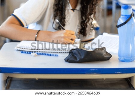 Student doing activity in classroom.