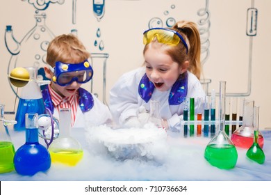 student doing research with chemical fluid in the laboratory - Powered by Shutterstock