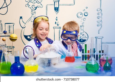 student doing research with chemical fluid in the laboratory - Powered by Shutterstock