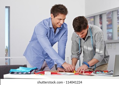 Student Getting A Fashion Design Training In A Studio