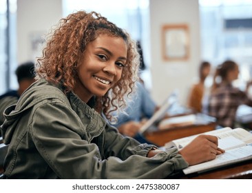 Student, girl and portrait in classroom with happiness in college or school in university for assignment. Female person, notebook and learning with reading for exam, project or tutorial for science - Powered by Shutterstock