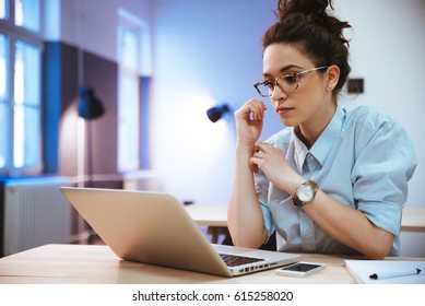 Student Girl Reading A Presentation On Laptop