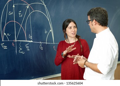 Student Girl Talking With Professor