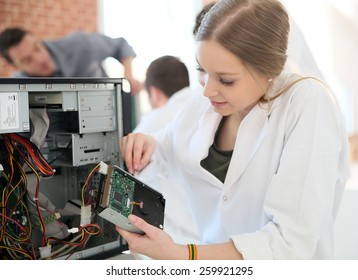 Student Girl In Technology Fixing Computer Hard Drive