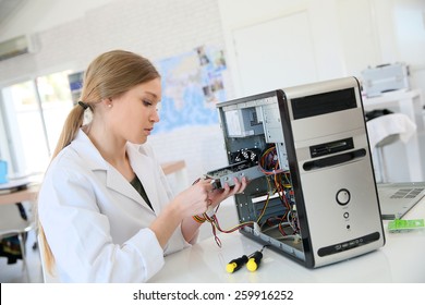 Student Girl In Technology Fixug Computer Hard Drive