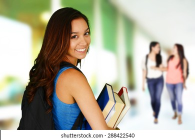 Student Going To Class At Her College