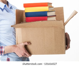 Student Holding A Big Box With Stack Of Books; Isolated On White