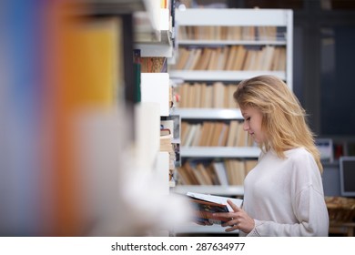 student at library