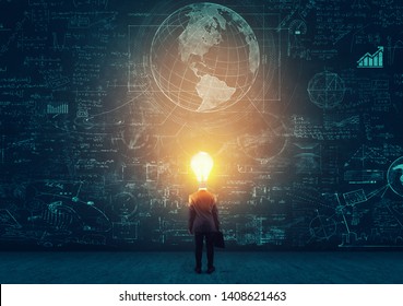 Student With Lit Light Bulb As A Head Solving Math Problem Drawn On Blackboard.