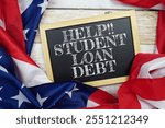 Student Loan Debt text messege with USA flag on wooden background