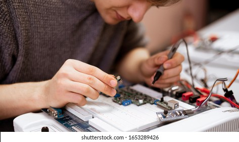 student making measurement and costruct the circuit board with engineer equipment, studying process - Powered by Shutterstock