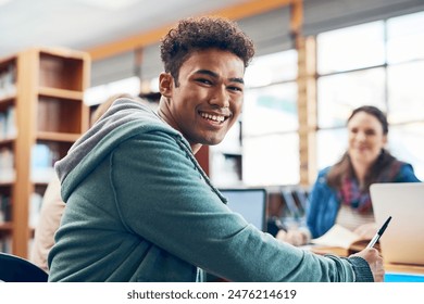 Student, man and happy with portrait in library for writing, scholarship and studying for exam knowledge. Gen z, person and smile for learning, education and research notes for university assessment - Powered by Shutterstock