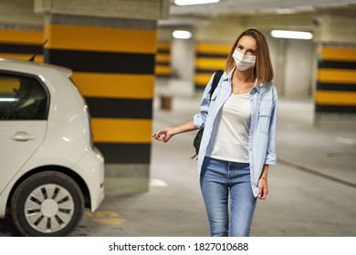 Student In Mask Leaving Car In Underground Parking Lot