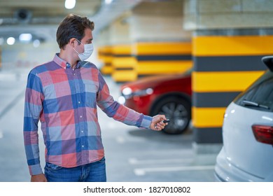 Student In Mask Leaving Car In Underground Parking Lot