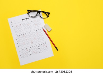 Student passing exam. Answer sheet, glasses, pencil and eraser on yellow background, flat lay. Space for text