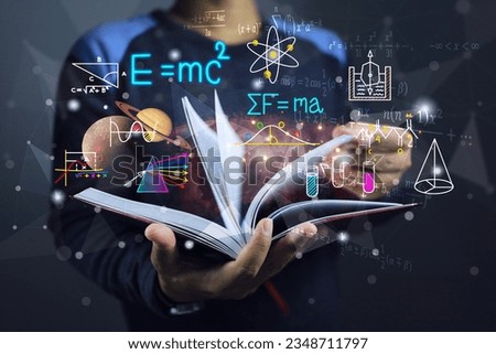 A student or physics scientist open a book to study theory of physics law of planetary gravitation motion and general relativity equation or light spectrum. Albert einstein and sir isaac newton laws