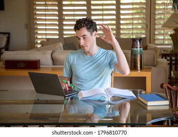 Student Raising His Hand In An Online Classroom