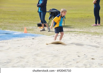 A Student From A School Doing A Long Jump At The Bramble Bay District Athletics,McPherson Park,Bracken Ridge,Brisbane,Australia On Thursday 3rd Of August, 2017. Time Started From 8:30am To 12:30pm.   