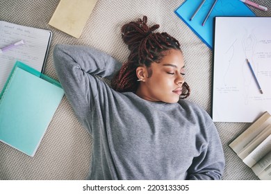 Student, Sleeping And Burnout With Study Books On House Living Room, Home Interior And Bedroom Floor. Top View Of Black Woman, Fashion Designer Or Art University Person Tired After Education Learning