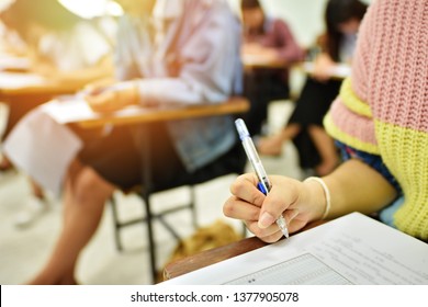 Student Takes Final Examination At The Test Center - Educational Concept Image Of Real Situation Training And Learning Activity In The Classroom At The Collage Or University Campus