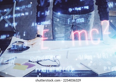 Student or teacher with mathematical and scientific formulas. Concepts of education. Symbols and equations on a virtual interface. Double exposure.