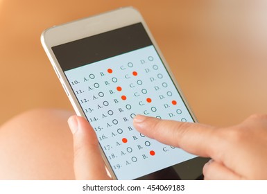 Student Testing Exercise, Exams Answer On Tablet With Multiple Choice Questions By Finger Clicking, Concept Educational Technology, Training Teachers To Use Computer Technology Improve Confidence.