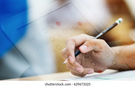 student testing in exercise, exams answer on a tablet with multiple-choice questions of e-learning by finger clicking : education concept