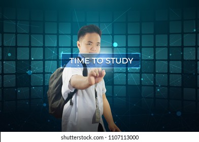 Student touching virtual screen. Time to study. Young school boy touching a hologram display screen with labelled Time to Study.