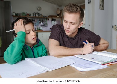 Student Is Tutoring An Elementary School Pupil At Home