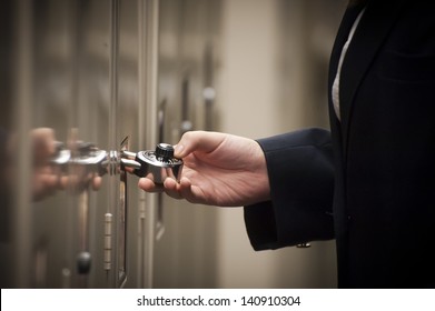 Student Unlocking A Locker