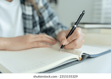 Student, use left-handed, inspiration, writer, writing ,creative ,recreation for imagine, writing ideas on notebook, to do list, good thinking work, journalist, Stylish, Dream image, relax, designer - Shutterstock ID 2315155329