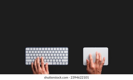 A student uses a keyboard and trackpad to search for information. An employee uses a keyboard and trackpad to do work. An image of a hand using a keyboard and trackpad on a black background.