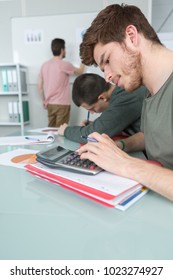 Student Using A Calculator