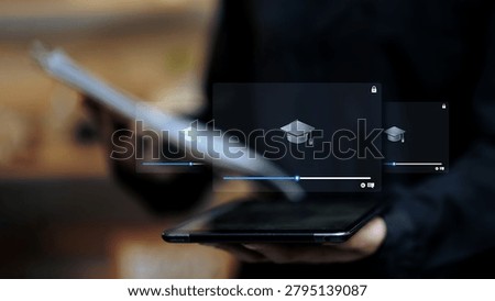 Student using a tablet to access online learning videos and digital education content. Concept of e-learning platform, remote education, virtual classroom, online courses, educational technology, and distance learning.
