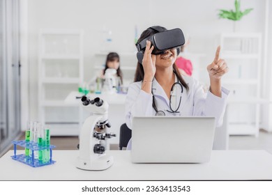 Student using VR glasses headset technology for help visual learning education science class room in modern school - Powered by Shutterstock