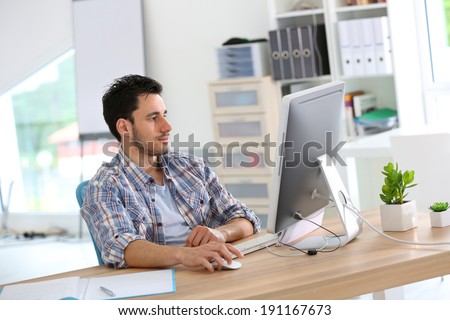 Student in web-design working in office