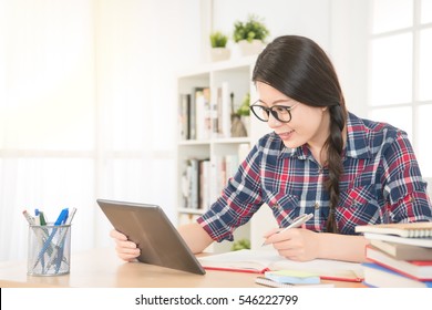 Student Woman Browsing Online With Notebook Digital Education Concept. Mixed Race Asian Chinese Model.