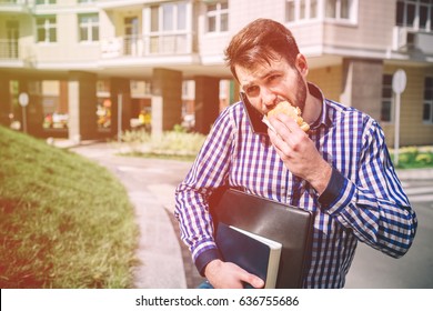 A student or a worker or a businessman is in a hurry, he does not have time, he is going to eat on the go. - Powered by Shutterstock