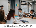 Students actively participate in a group discussion with their teacher in a modern classroom. The scene reflects collaborative learning and engagement in an educational environment.