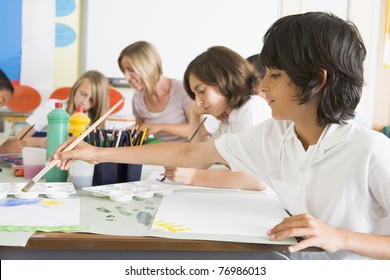 Students In Art Class With Teacher (depth Of Field)